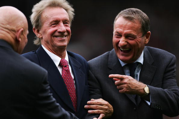 MANCHESTER, UNITED KINGDOM - OCTOBER 22:  Roger Hunt (R) shares a joke with Denis Law prior to the Barclays Premiership match between Manchester United and Liverpool at Old Trafford on October 22, 2006 in Manchester, England.  (Photo by Michael Steele/Get