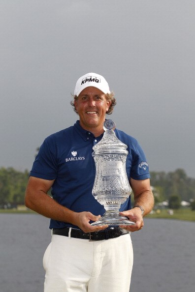 HUMBLE, TX - APRIL 03:  Phil Mickelson holds the trophy after winning the Shell Houston Open at Redstone Golf Club on April 3, 2011 in Humble, Texas.  (Photo by Michael Cohen/Getty Images)