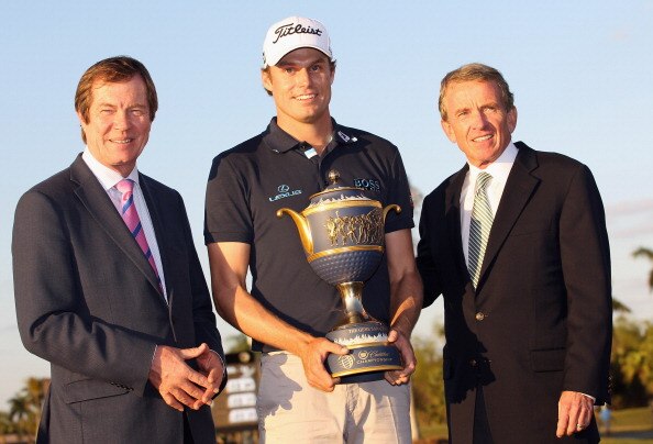 DORAL, FL - MARCH 13:  PGA Tour commissioner Tim Finchem (R) and George O'Grady, Chief Executive of The European Tour pose with Nick Watney after the final round of the 2011 WGC- Cadillac Championship at the TPC Blue Monster at the Doral Golf Resort and S