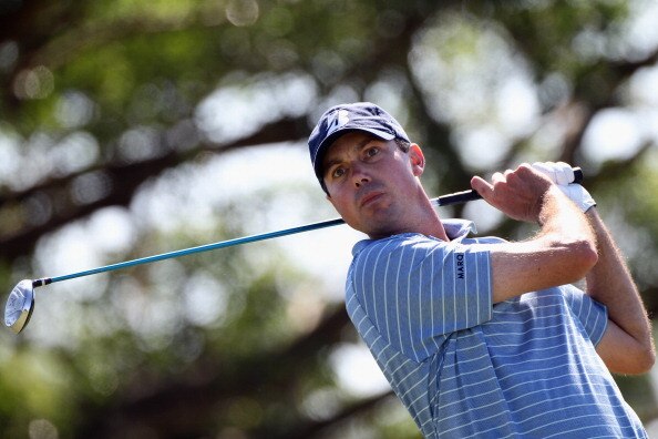 DORAL, FL - MARCH 13:  Matt Kuchar hits a shot during the final round of the 2011 WGC- Cadillac Championship at the TPC Blue Monster at the Doral Golf Resort and Spa on March 13, 2011 in Doral, Florida.  (Photo by Sam Greenwood/Getty Images)