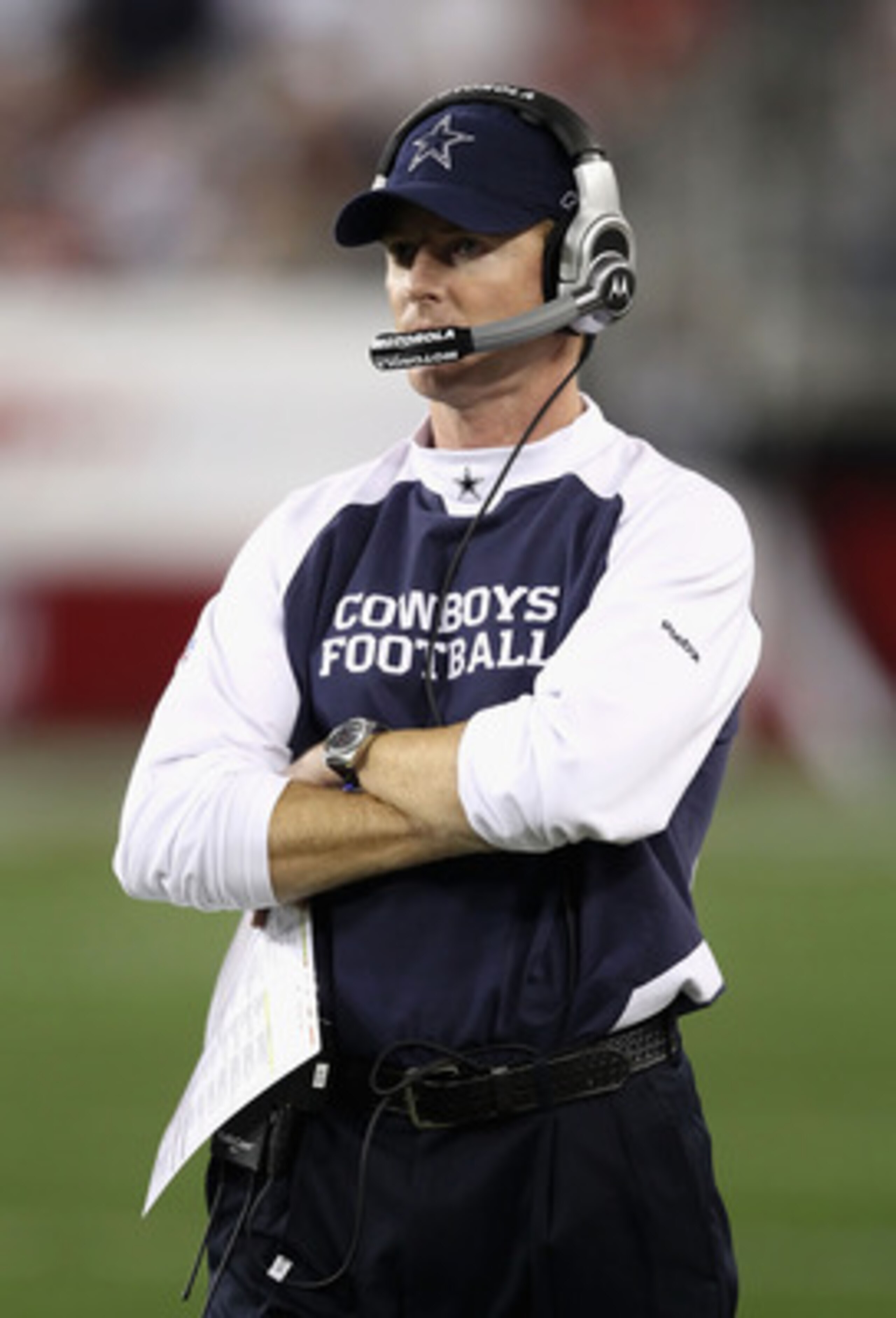 GLENDALE, AZ - DECEMBER 25: Head coach Jason Garrett of the Dallas Cowboys watches from the sidelines during the NFL game against the Arizona Cardinals at the University of Phoenix Stadium on December 25, 2010 in Glendale, Arizona. The Cardinals defeated GLENDALE, AZ - DECEMBER 25: Head coach Jason Garrett of the Dallas Cowboys watches from the sidelines during the NFL game against the Arizona Cardinals at the University of Phoenix Stadium on December 25, 2010 in Glendale, Arizona. The Cardinals defeated