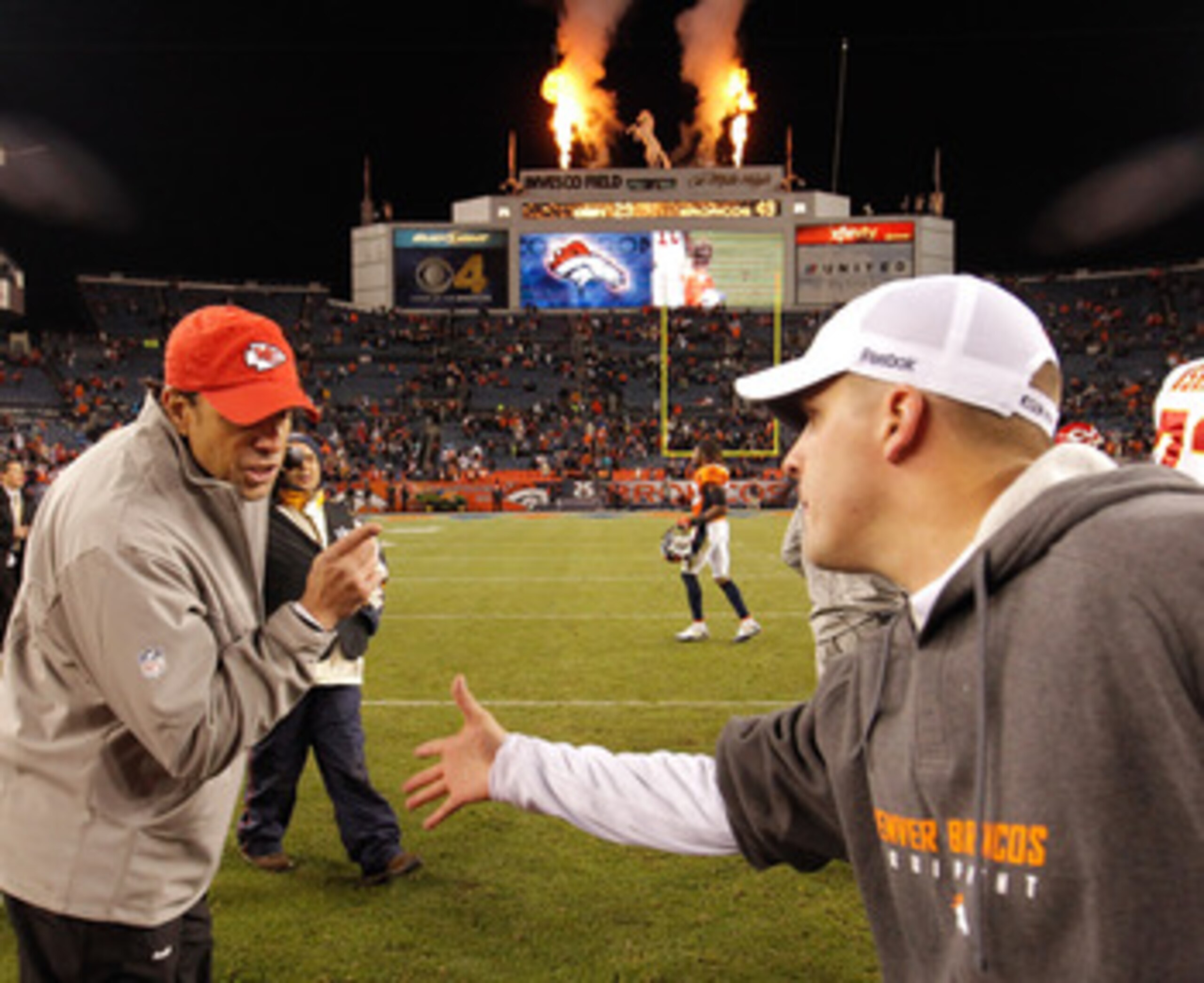 DENVER - NOVEMBER 14: Head coach Todd Haley of the Kansas City Chiefs has some unwelcome words with head coach Josh McDaniels of the Denver Broncos as he refuses to shake his hand after the Broncos 49-29 win at INVESCO Field at Mile High on November 14, DENVER - NOVEMBER 14: Head coach Todd Haley of the Kansas City Chiefs has some unwelcome words with head coach Josh McDaniels of the Denver Broncos as he refuses to shake his hand after the Broncos 49-29 win at INVESCO Field at Mile High on November 14,