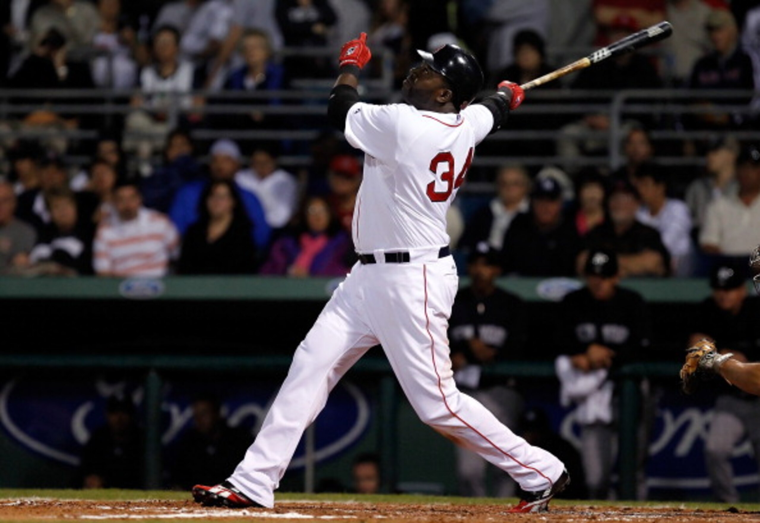 FORT MYERS, FL - MARCH 14:  Designated hitter David Ortiz #34 of the Boston Red Sox fouls off a pitch against the New York Yankees during a Grapefruit League Spring Training Game at City of Palms Park on March 14, 2011 in Fort Myers, Florida.  (Photo by J