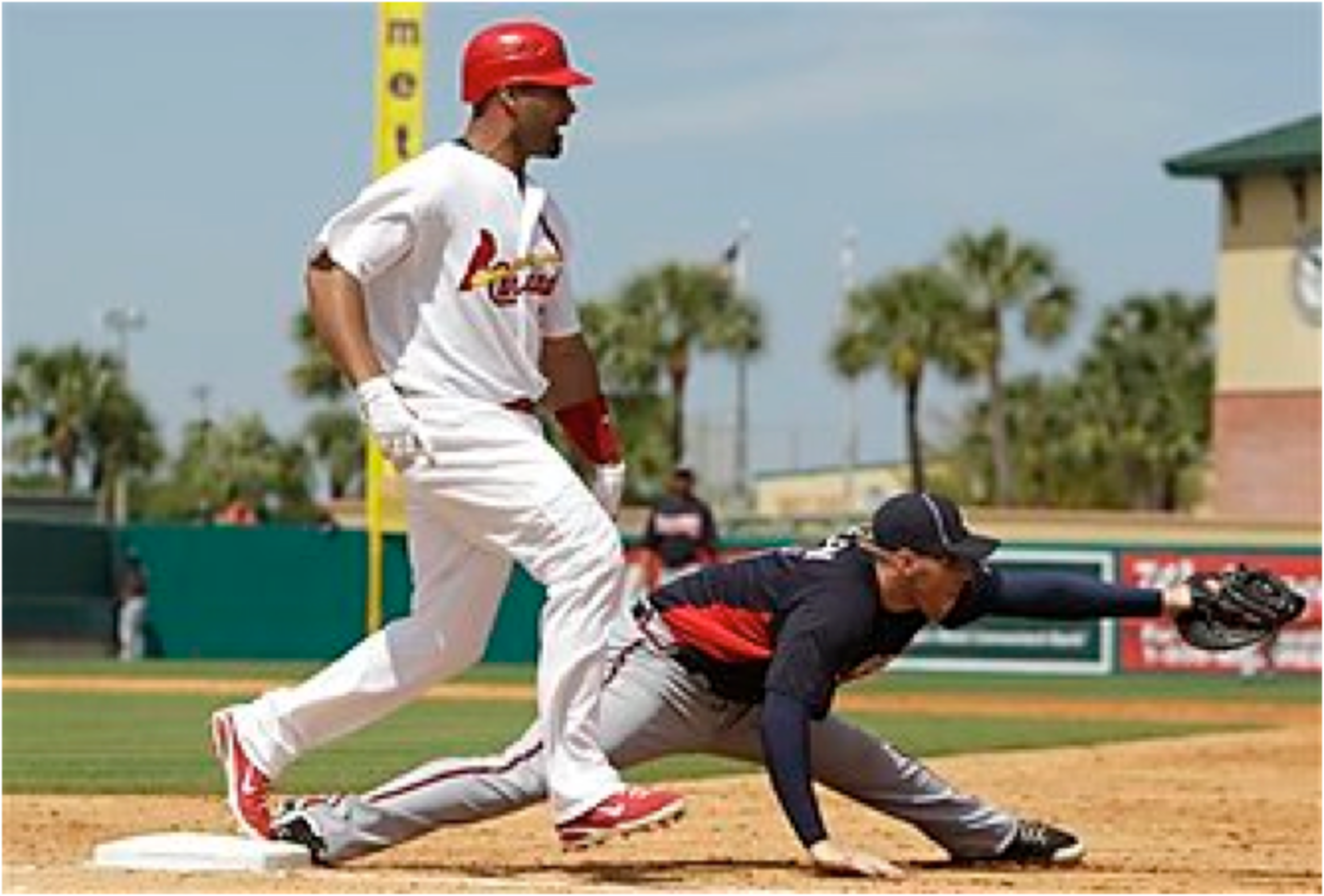 1st Basemen Freddie Freeman and Albert Pujols 1st Basemen Freddie Freeman and Albert Pujols