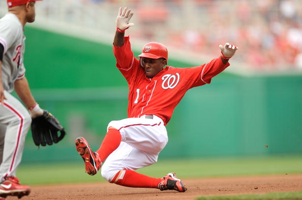 WASHINGTON - APRIL 08:  Nyjer Morgan #1 of the Washington Nationals slides into third base for a triple in the first inning against the Philadelphia Phillies at Nationals Park on April 8, 2010 in Washington, DC.  (Photo by Greg Fiume/Getty Images)