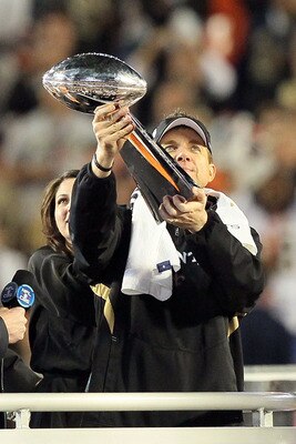 MIAMI GARDENS, FL - FEBRUARY 07: Head coach Sean Payton of the New Orleans Saints holds up the Vince Lombardi Trophy after defeating the Indianapolis Colts during Super Bowl XLIV on February 7, 2010 at Sun Life Stadium in Miami Gardens, Florida.  (Photo b