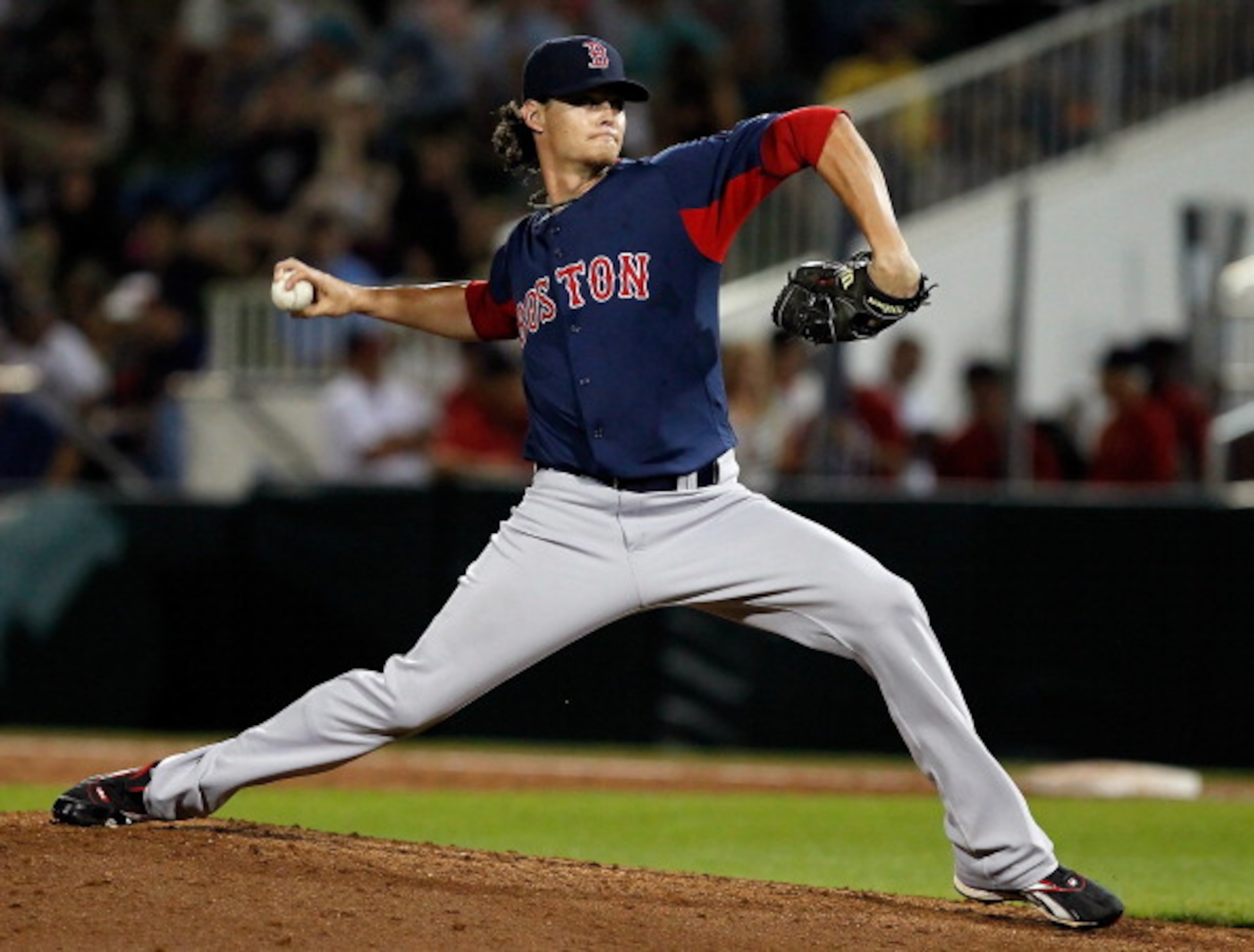 FORT MYERS, FL - FEBRUARY 27:  Pitcher Clay Buchholz #11 of the Boston Red Sox pitches against the Minnesota Twins during a Grapefruit League Spring Training Game at Hammond Stadium on February 27, 2011 in Fort Myers, Florida.  (Photo by J. Meric/Getty Im