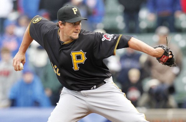 CHICAGO, IL - APRIL 01:  Joel Hanrahan #52 of the Pittsburgh Pirates throws a ninth inning pitch while playing the Chicago Cubs during opening day at Wrigley Field on April 1, 2011 in Chicago, Illinois. Pittsburgh won the game 6-3.  (Photo by Gregory Sham