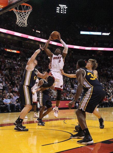 MIAMI - NOVEMBER 09:  Dwayne Wade #3  of the Miami Heat shoots during a game against the Utah Jazz at American Airlines Arena on November 9, 2010 in Miami, Florida. NOTE TO USER: User expressly acknowledges and agrees that, by downloading and/or using thi