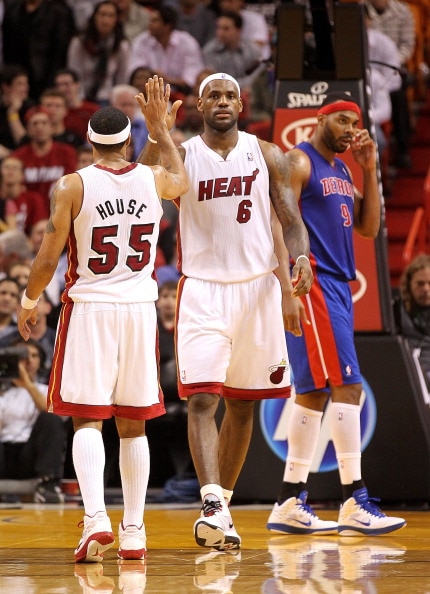 MIAMI, FL - JANUARY 28:  LeBron James #6 of the Miami Heat is congratulated by Eddie House #55 during a game against the Detroit Pistons at American Airlines Arena on January 28, 2011 in Miami, Florida. NOTE TO USER: User expressly acknowledges and agrees