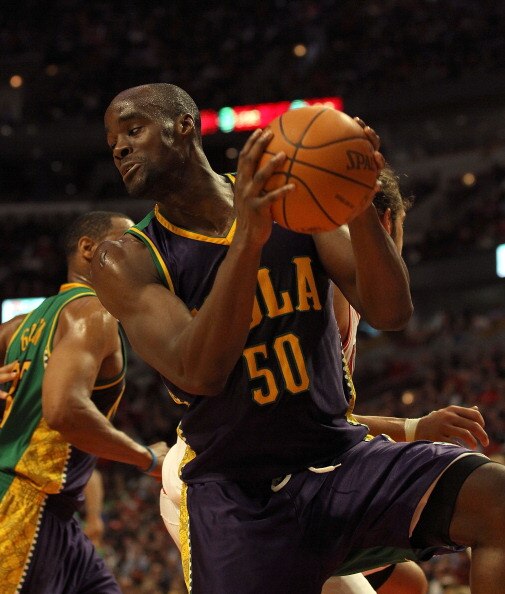 CHICAGO, IL - MARCH 07: Emeka Okafor #50 of the New Orleans Hornets grabs a rebound against the Chicago Bulls at the United Center on March 7, 2011 in Chicago, Illinois. The Bulls defeated the Hornets 85-77. NOTE TO USER: User expressly acknowledges and a