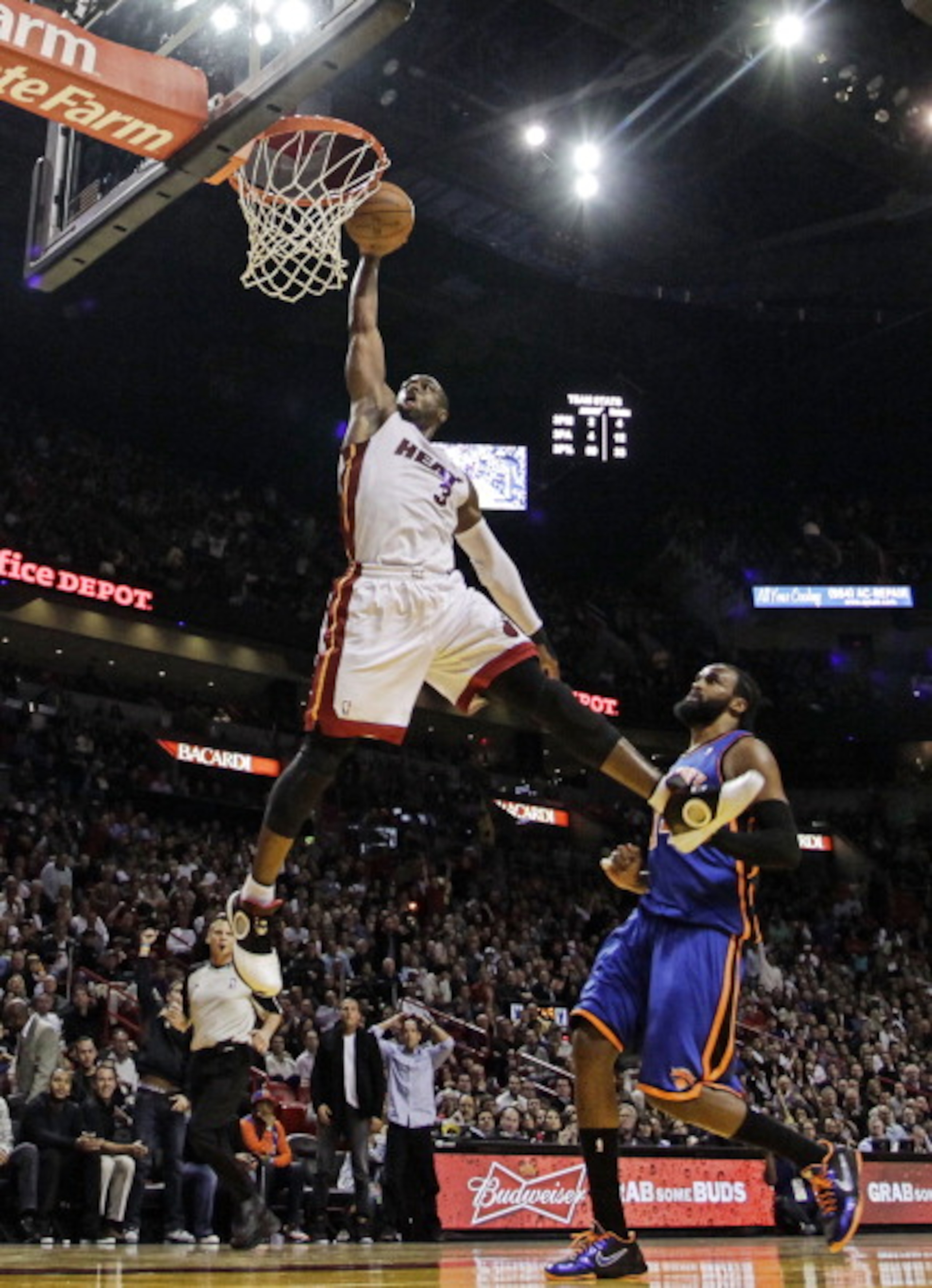 MIAMI - DECEMBER 28: Guard Dwyane Wade #3 of the Miami Heat dunks against the New York Knicks at American Airlines Arena on December 28, 2010 in Miami, Florida. Wade had 40 points as the Heat defeated the Knicks 106-98. (Photo by Marc Serota/Getty Image MIAMI - DECEMBER 28: Guard Dwyane Wade #3 of the Miami Heat dunks against the New York Knicks at American Airlines Arena on December 28, 2010 in Miami, Florida. Wade had 40 points as the Heat defeated the Knicks 106-98. (Photo by Marc Serota/Getty Image