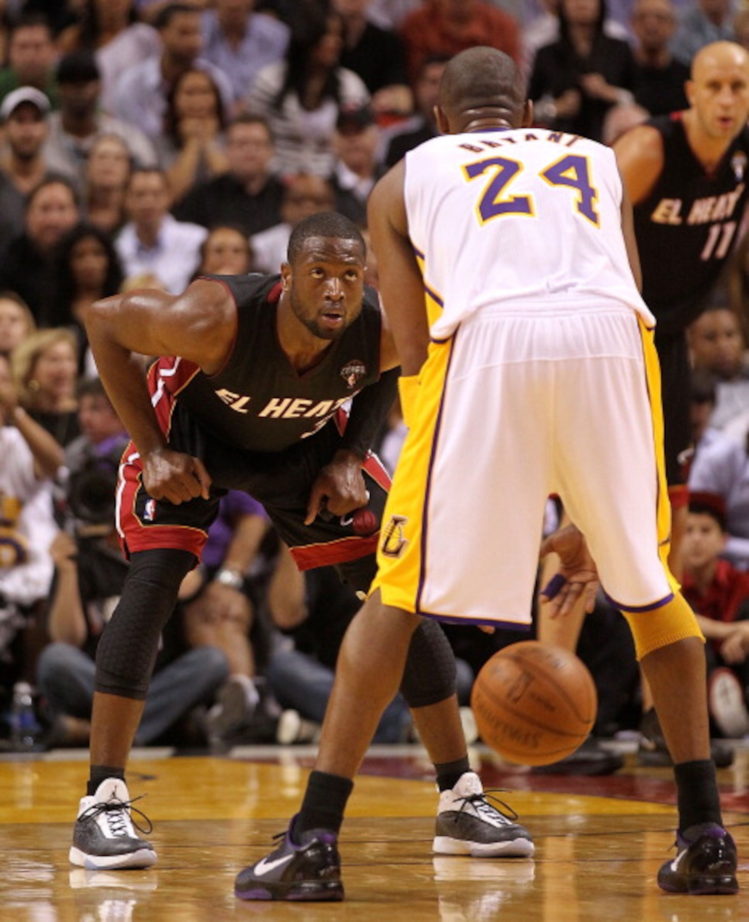 MIAMI, FL - MARCH 10: Dwyane Wade #3 of the Miami Heat defends Kobe Bryant #24 of the Los Angeles Lakers during a game at American Airlines Arena on March 10, 2011 in Miami, Florida. NOTE TO USER: User expressly acknowledges and agrees that, by downloadi MIAMI, FL - MARCH 10: Dwyane Wade #3 of the Miami Heat defends Kobe Bryant #24 of the Los Angeles Lakers during a game at American Airlines Arena on March 10, 2011 in Miami, Florida. NOTE TO USER: User expressly acknowledges and agrees that, by downloadi