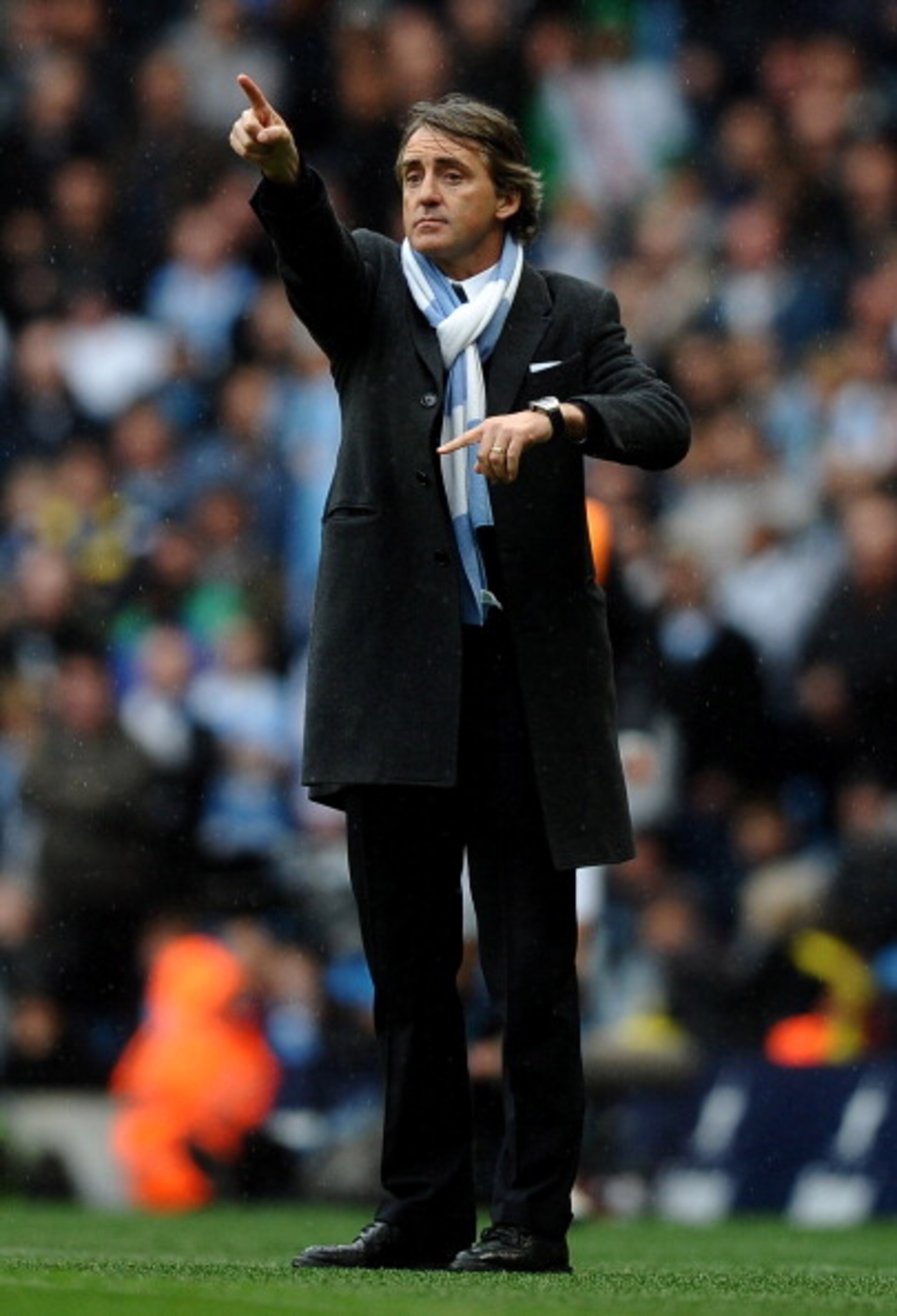 MANCHESTER, ENGLAND - APRIL 03: Manchester City Manager Roberto Mancini gestures to his players during the Barclays Premier League match between Manchester City and Sunderland at the City of Manchester Stadium on April 3, 2011 in Manchester, England. (P MANCHESTER, ENGLAND - APRIL 03: Manchester City Manager Roberto Mancini gestures to his players during the Barclays Premier League match between Manchester City and Sunderland at the City of Manchester Stadium on April 3, 2011 in Manchester, England. (P
