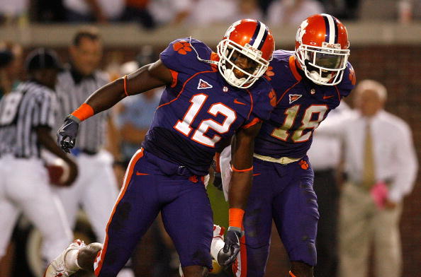 ATLANTA - SEPTEMBER 10:  Marcus Gilchrist #12 and Crezdon Butler #18 of the Clemson Tigers against the Georgia Tech Yellow Jackets at Bobby Dodd Stadium on September 10, 2009 in Atlanta, Georgia.  (Photo by Kevin C. Cox/Getty Images)