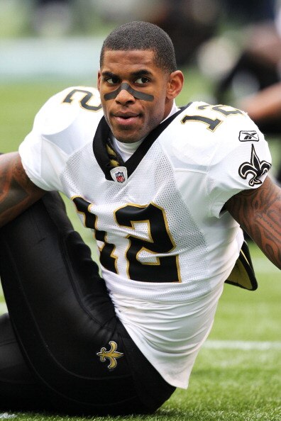 SEATTLE, WA - JANUARY 08:  Marques Colston #12 of the New Orleans Saints stretches before their game against the Seattle Seahawks during the 2011 NFC wild-card playoff game at Qwest Field on January 8, 2011 in Seattle, Washington.  (Photo by Otto Greule J