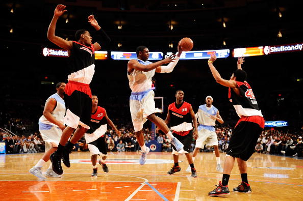 NEW YORK - APRIL 17:  Terrence Jones #1 of West Team goes for a shot against Perry Jones #3 and Jelan Kendrick #45 of East Team during the National Game at the 2010 Jordan Brand classic at Madison Square Garden on April 17, 2010 in New York City.  (Photo