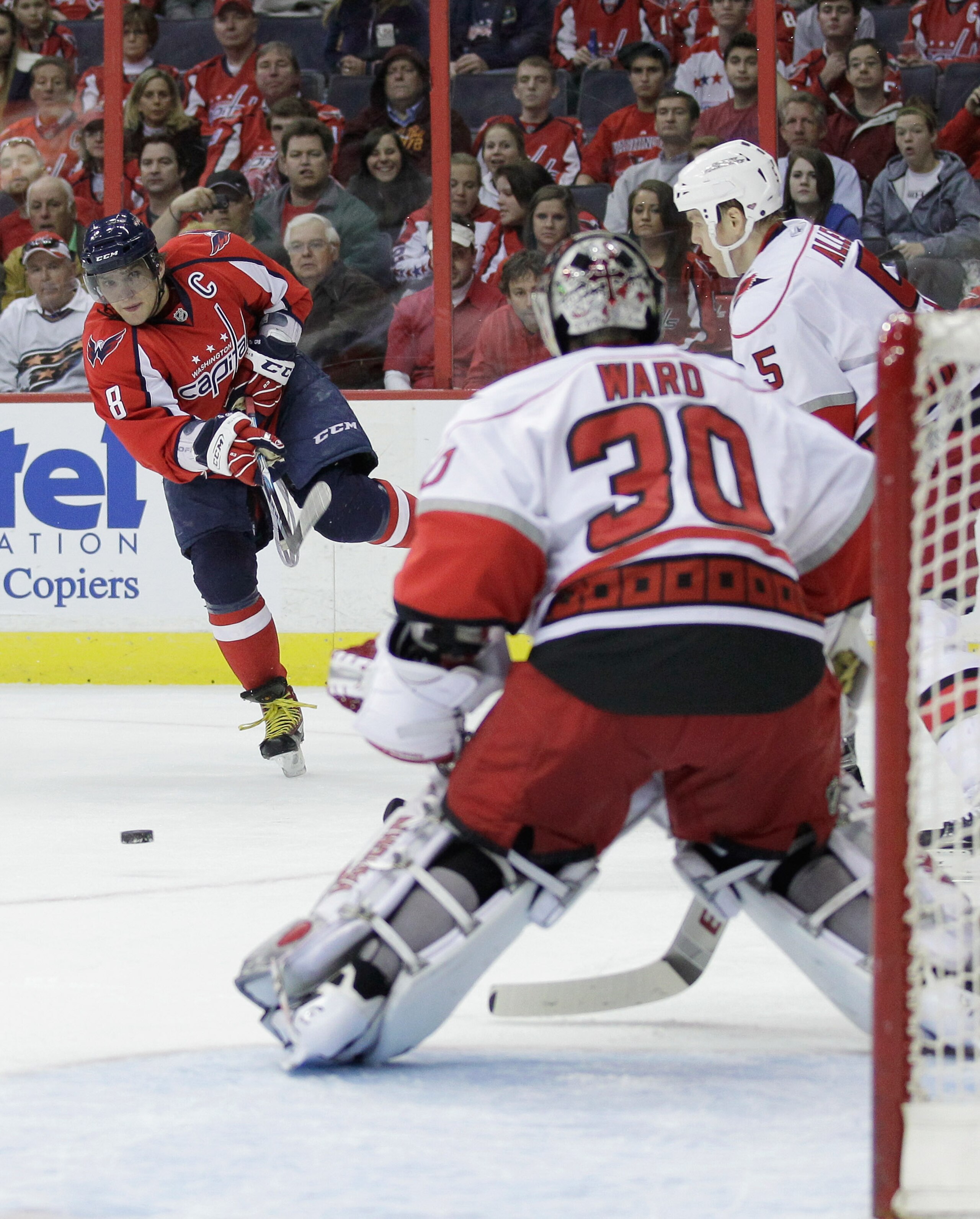 WASHINGTON, DC - MARCH 29:  Alex Ovechkin #8 of the Washington Capitals shoots on goalie Cam Ward #30 of the Carolina Hurricanes during the first period at the Verizon Center on March 29, 2011 in Washington, DC.  (Photo by Rob Carr/Getty Images)
