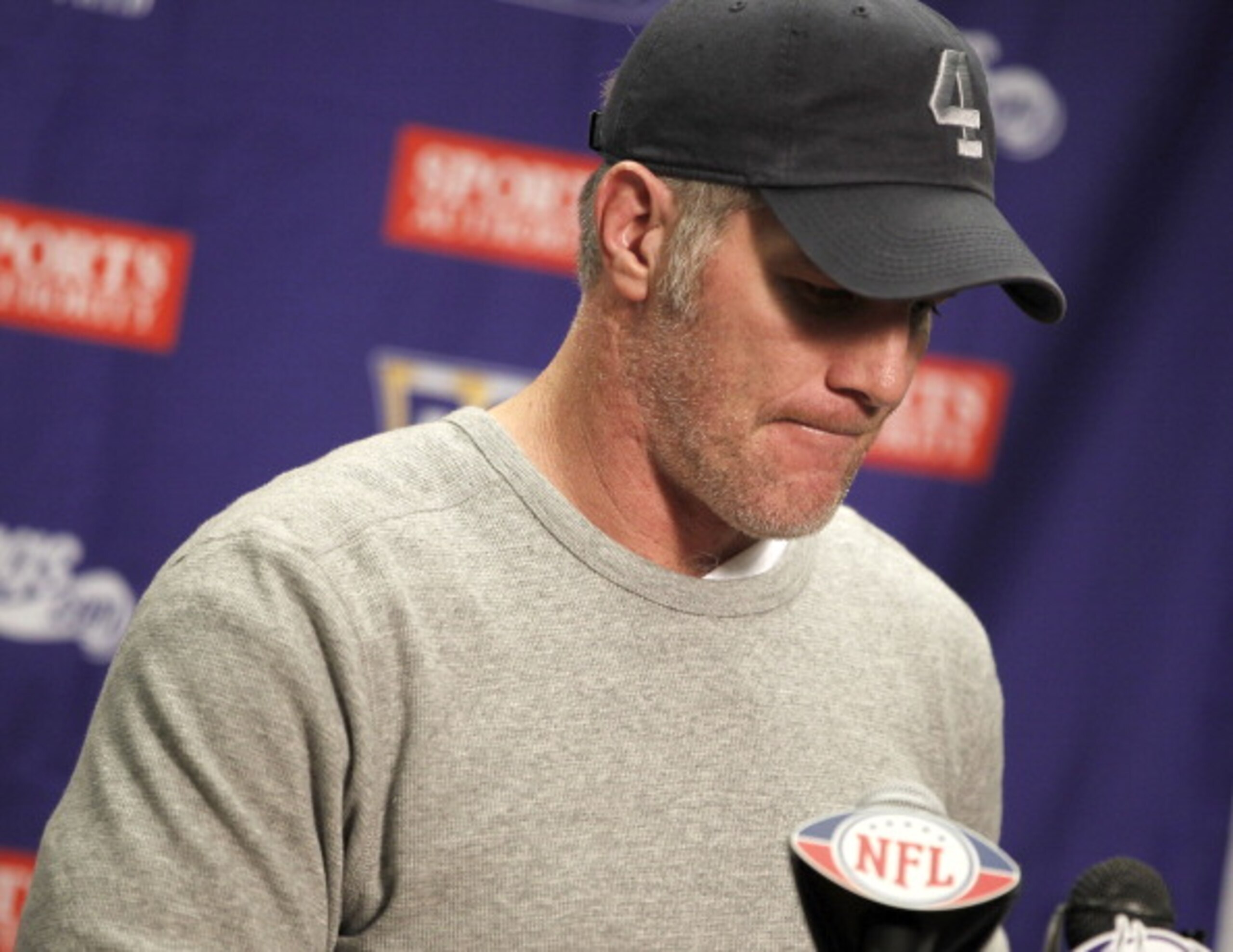 DETROIT, MI - JANUARY 02: Brett Favre #4 of the Minnesota Vikings talks at a post game press conference after a 13-20 loss to the Detroit Lions at Ford Field on January 2, 2011 in Detroit, Michigan. (Photo by Gregory Shamus/Getty Images) DETROIT, MI - JANUARY 02: Brett Favre #4 of the Minnesota Vikings talks at a post game press conference after a 13-20 loss to the Detroit Lions at Ford Field on January 2, 2011 in Detroit, Michigan. (Photo by Gregory Shamus/Getty Images)
