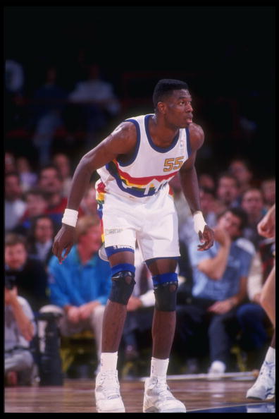 1991:  Center Dikembe Mutombo of the Denver Nuggets looks on during a game at the McNichols Sports Arena in Denver, Colorado. Mandatory Credit: Tim DeFrisco  /Allsport Mandatory Credit: Tim DeFrisco  /Allsport