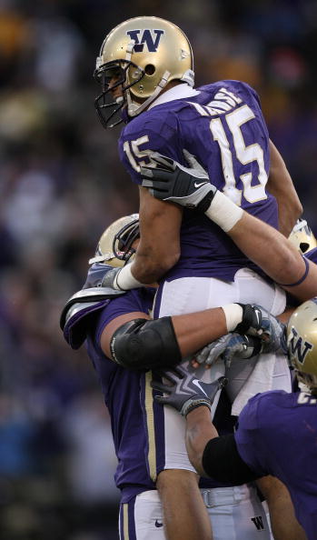 SEATTLE - DECEMBER 05:  Jermaine Kearse #15 is congratulated by teammates after he scored a touchdown against the California Bears on December 5, 2009 at Husky Stadium in Seattle, Washington. The Huskies defeated the Bears 42-10. (Photo by Otto Greule Jr/