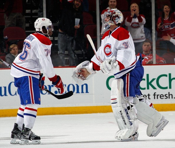 NEWARK, NJ - APRIL 02:  P.K. Subban #76 of the Montreal Canadians congratulates goalie Carey Price #31 on a win over the New Jersey Devils in an NHL hockey game at the Prudential Center on April 2, 2011 in Newark, New Jersey.  (Photo by Paul Bereswill/Get