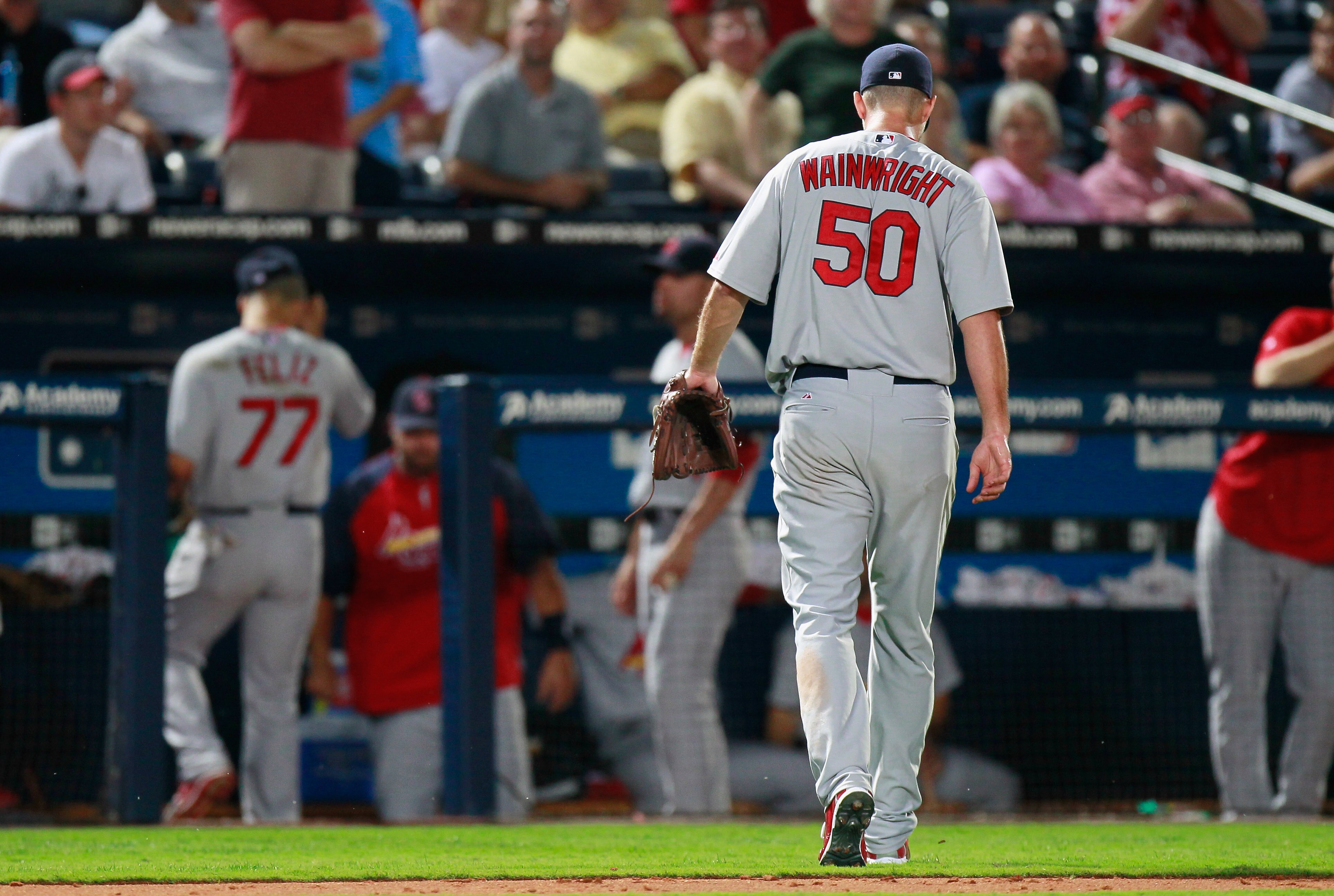 ATLANTA - SEPTEMBER 09:  Starting pitcher Adam Wainwright #50 of the St. Louis Cardinals walks off the field at the end of the eighth inning against the Atlanta Braves at Turner Field on September 9, 2010 in Atlanta, Georgia.  (Photo by Kevin C. Cox/Getty