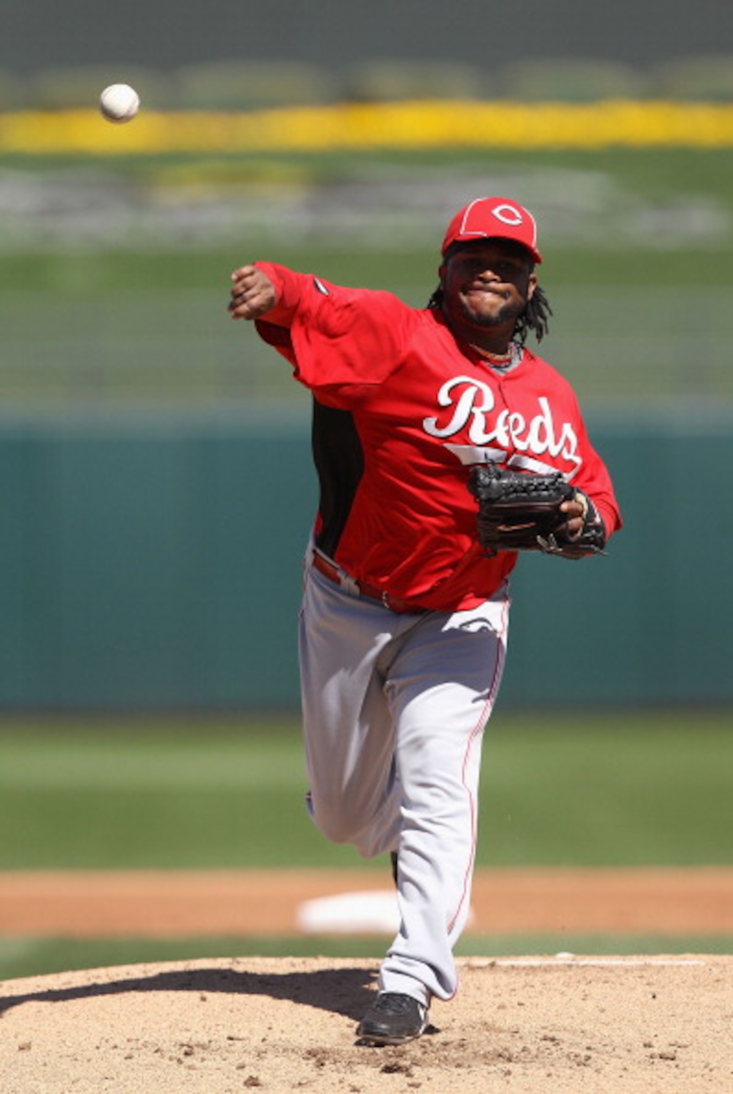 SURPRISE, AZ - MARCH 11:  Starting pitcher Johnny Cueto #47 of the Cincinnati Reds pitches against the Texas Rangers during the spring training game at Surprise Stadium on March 11, 2011 in Surprise, Arizona.  (Photo by Christian Petersen/Getty Images)