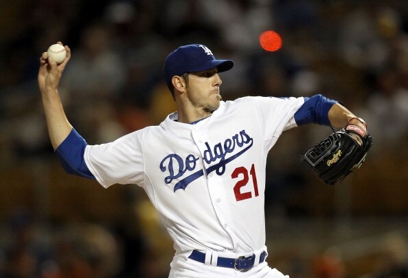 GLENDALE, AZ - MARCH 04:  Starting pticher Jon Garland #21 of the Los Angeles Dodgers pitches against the San Francisco Giants during the spring training game at Camelback Ranch on March 4, 2011 in Glendale, Arizona.  (Photo by Christian Petersen/Getty Im