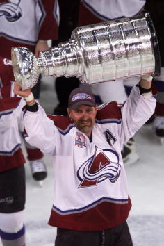 9 Jun 2001: Ray Bourque #77 of the Colorado Avalanche hoists the Stanley Cup after defeating the New Jersey Devils during the Stanley Cup finals at the Pepsi Center in Denver, Colorado. The Avalanche defeated the Devils 3-1 to win the series 4-3. DIGITAL