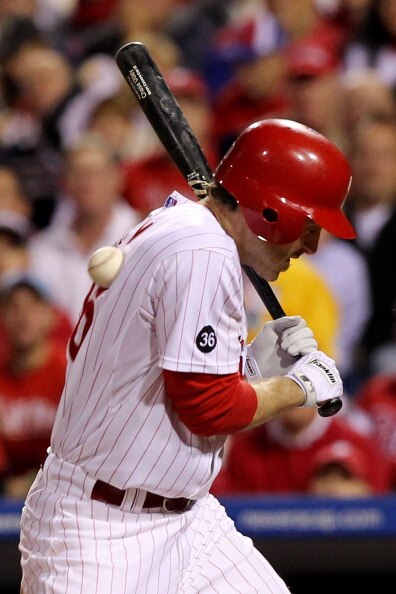 PHILADELPHIA - OCTOBER 23:  Chase Utley #26 of the Philadelphia Phillies is hit by a pitch in the third inning against the San Francisco Giants in Game Six of the NLCS during the 2010 MLB Playoffs at Citizens Bank Park on October 23, 2010 in Philadelphia,