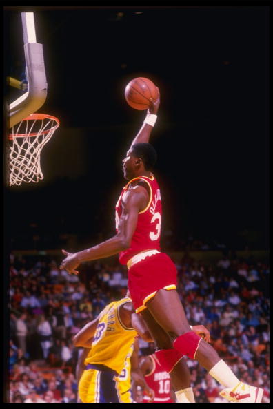 Center Hakeem Olajuwon of the Houston Rockets goes up for two during a game against the Los Angeles Lakers at The Summit in Houston, Texas.