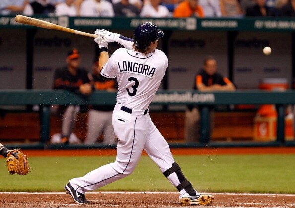 ST. PETERSBURG, FL - APRIL 01:  Infielder Evan Longoria #3 of the Tampa Bay Rays fouls off a pitch against the Baltimore Orioles during the Opening Day game at Tropicana Field on April 1, 2011 in St. Petersburg, Florida.  (Photo by J. Meric/Getty Images)