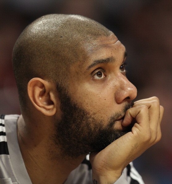 CHICAGO, IL - FEBRUARY 17: Tim Duncan #21 of the San Antonio Spurs watches from the bench as his teammates take on the Chicago Bulls at the United Center on February 17, 2011 in Chicago, Illinois. The Bulls defeated the Spurs 109-99. NOTE TO USER: User ex