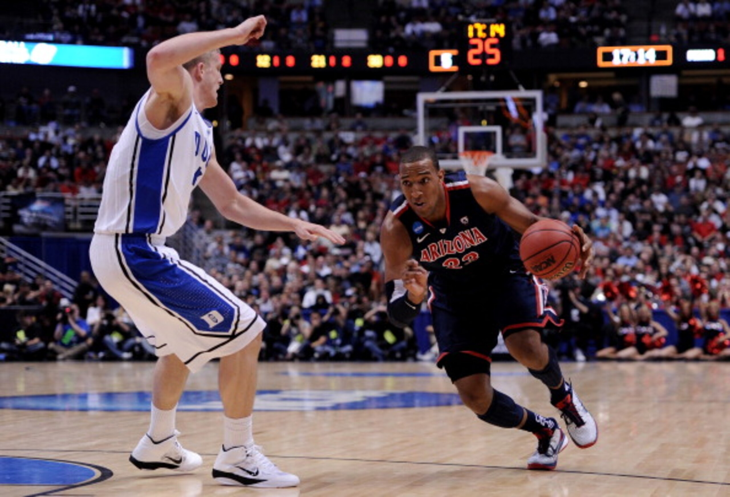 ANAHEIM, CA - MARCH 24:  Derrick Williams #23 of the Arizona Wildcats handles the ball against Mason Plumlee #5 of the Duke Blue Devils during the west regional semifinal of the 2011 NCAA men's basketball tournament at the Honda Center on March 24, 2011 i