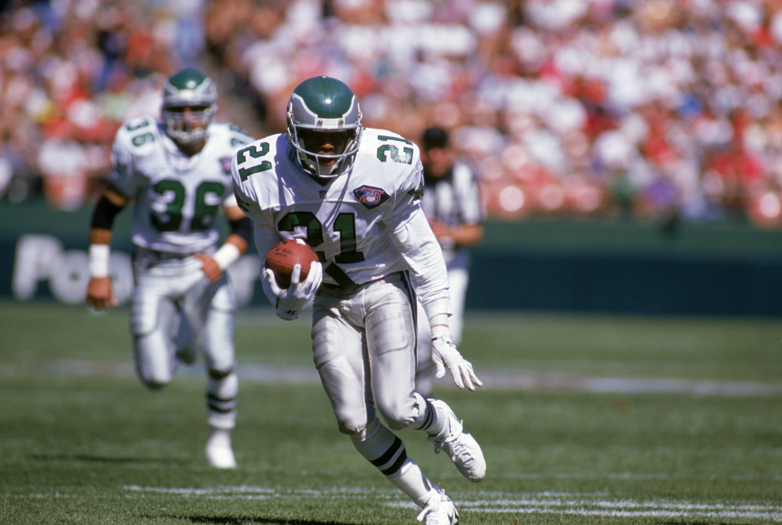 SAN FRANCISCO - OCTOBER 2:  Cornerback Eric Allen #21 of the Philadelphia Eagles runs with the ball during a game against the San Francisco 49ers at Candlestick Park on October 2, 1994 in San Francisco, California.  The Eagles won 40-8.  (Photo by George
