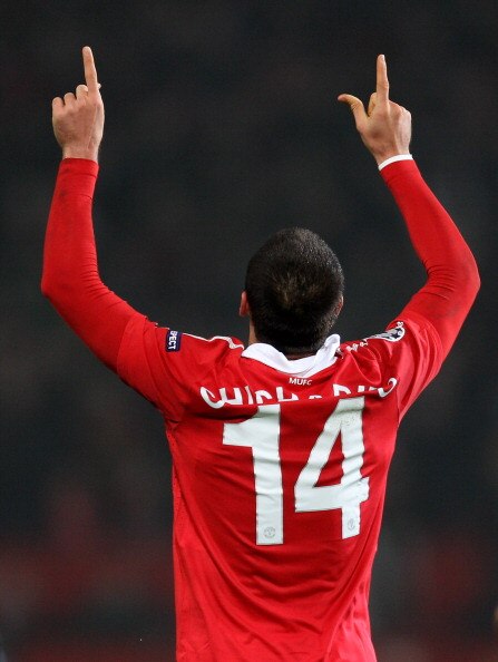 MANCHESTER, ENGLAND - MARCH 15:  Javier Hernandez (R) of Manchester United celebrates as he  scores the second goal during the UEFA Champions League round of 16 second leg match between Manchester United and Marseille at Old Trafford on March 15, 2011 in