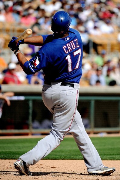 GLENDALE, AZ - MARCH 15:  Nelson Cruz #17 of the Texas Rangers plays against the Los Angeles Dodgers during the spring training baseball game at Camelback Ranch on March 15, 2011 in Glendale, Arizona.  (Photo by Kevork Djansezian/Getty Images)
