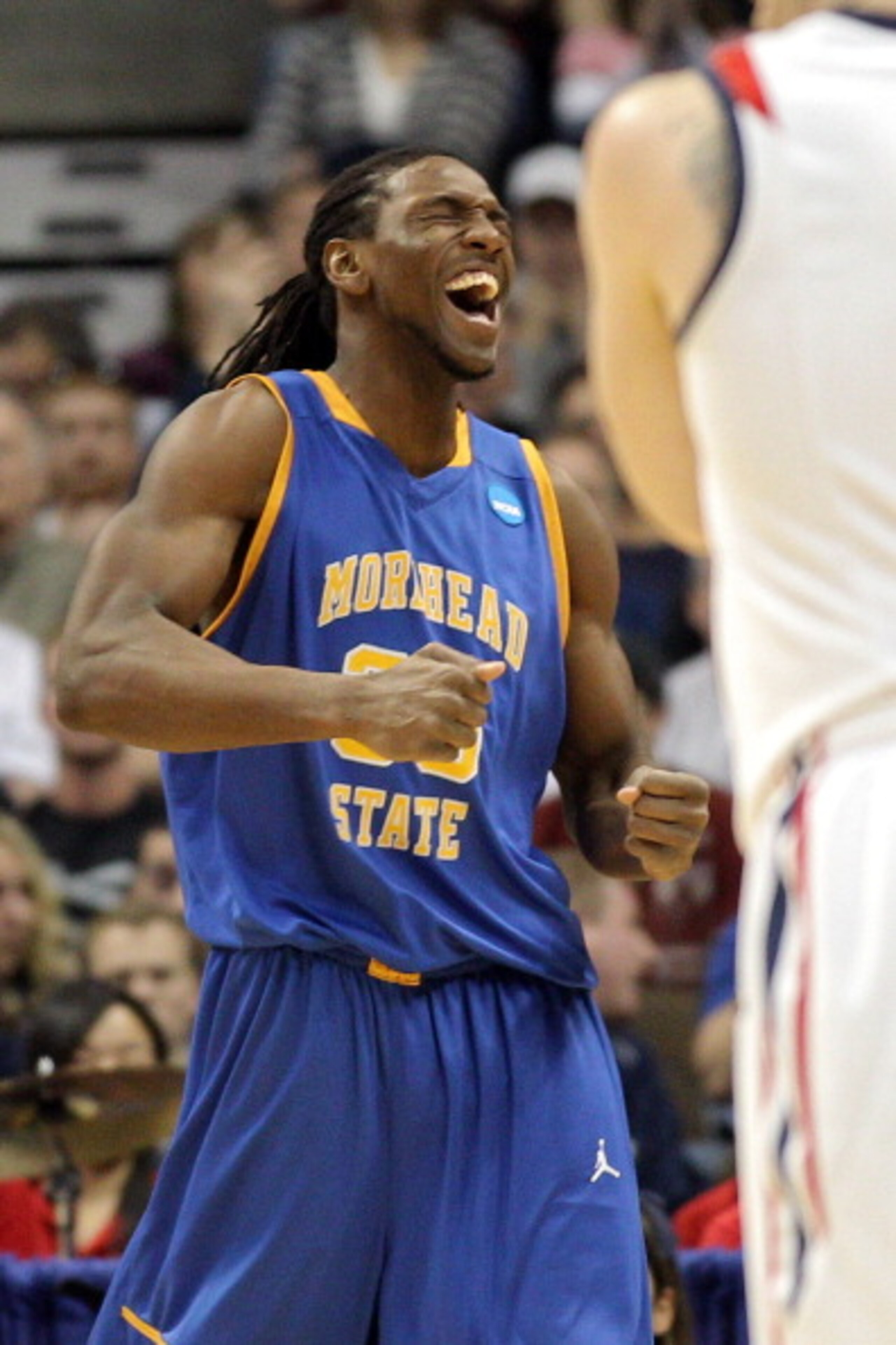 DENVER, CO - MARCH 19: Kenneth Faried #35 of the Morehead State Eagles dunks reacts after a play against the Richmond Spiders during the third round of the 2011 NCAA men's basketball tournament at Pepsi Center on March 19, 2011 in Denver, Colorado. (Pho DENVER, CO - MARCH 19: Kenneth Faried #35 of the Morehead State Eagles dunks reacts after a play against the Richmond Spiders during the third round of the 2011 NCAA men's basketball tournament at Pepsi Center on March 19, 2011 in Denver, Colorado. (Pho
