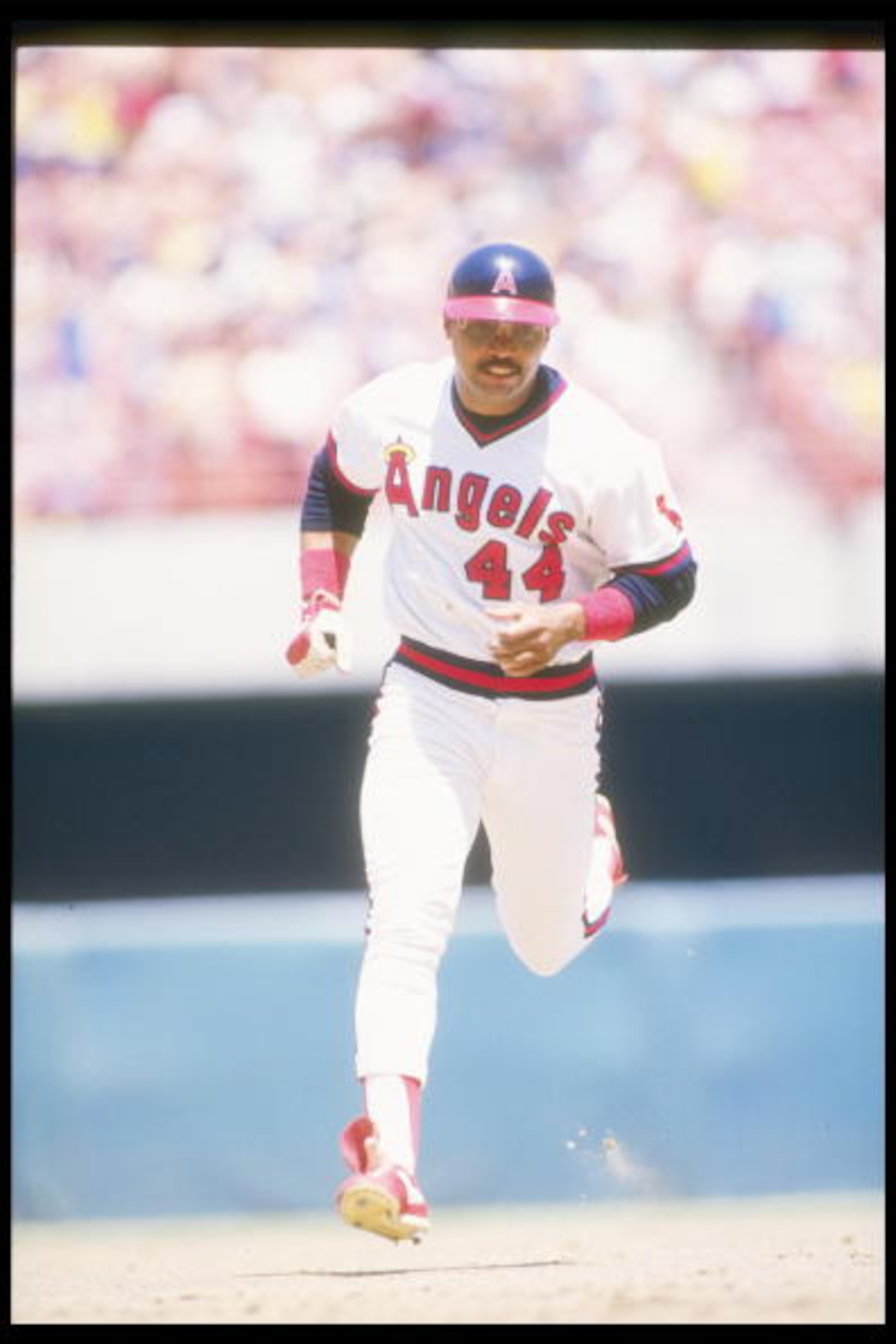 1986:  Reggie Jackson of the California Angels runs around the bases during a game at Anaheim Stadium in Anaheim, California. Mandatory Credit: Rick Stewart  /Allsport