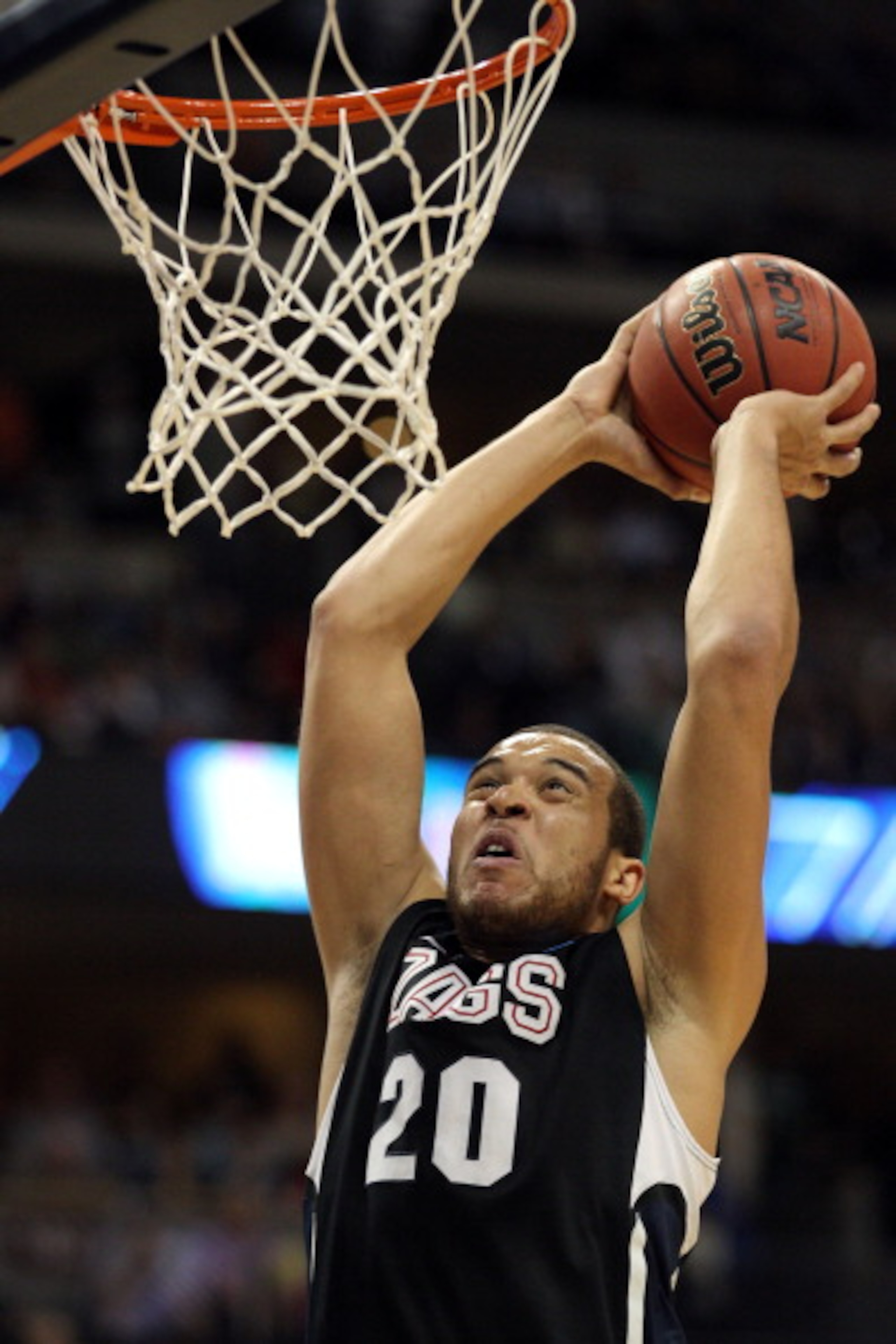 DENVER, CO - MARCH 19: Elias Harris #20 of the Gonzaga Bulldogs goes up for a dunk against the Brigham Young Cougars during the third round of the 2011 NCAA men's basketball tournament at Pepsi Center on March 19, 2011 in Denver, Colorado. (Photo by Jus DENVER, CO - MARCH 19: Elias Harris #20 of the Gonzaga Bulldogs goes up for a dunk against the Brigham Young Cougars during the third round of the 2011 NCAA men's basketball tournament at Pepsi Center on March 19, 2011 in Denver, Colorado. (Photo by Jus
