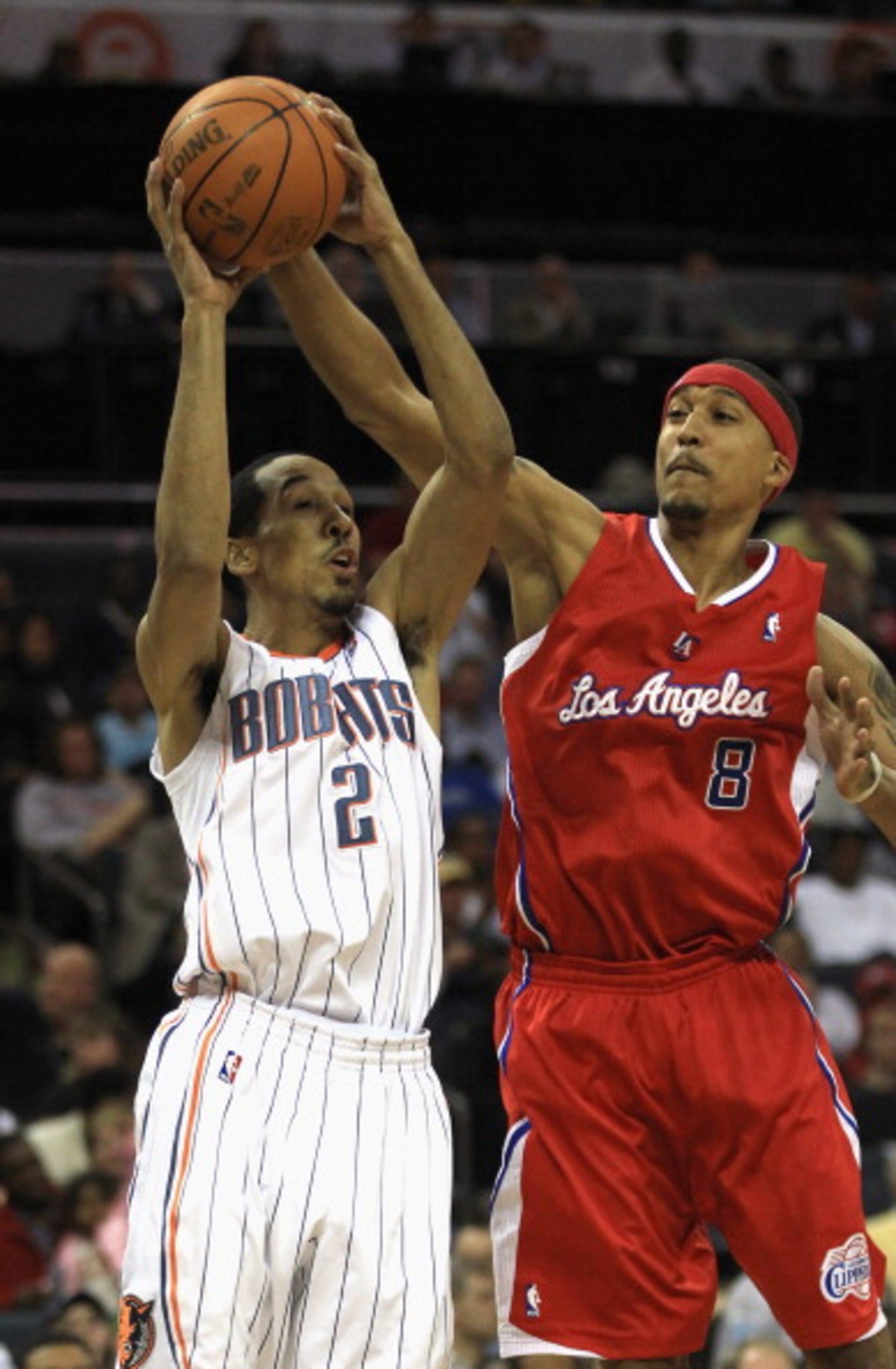 CHARLOTTE, NC - MARCH 07: Jamario Moon #8 of the Los Angeles Clippers tries to stop Shaun Livingston #2 of the Charlotte Bobcats during their game at Time Warner Cable Arena on March 7, 2011 in Charlotte, North Carolina. NOTE TO USER: User expressly ackn CHARLOTTE, NC - MARCH 07: Jamario Moon #8 of the Los Angeles Clippers tries to stop Shaun Livingston #2 of the Charlotte Bobcats during their game at Time Warner Cable Arena on March 7, 2011 in Charlotte, North Carolina. NOTE TO USER: User expressly ackn