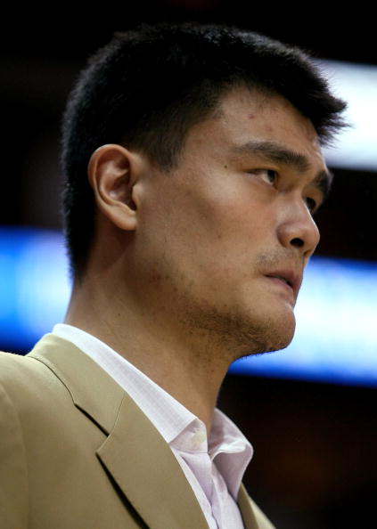 HOUSTON - APRIL 21:  Injured center Yao Ming #11 of the Houston Rockets watches the final moments of Game Two of the Western Conference Quarterfinals agaisnt the Utah Jazz during the 2008 NBA Playoffs at the Toyota Center April 21, 2008 in Houston, Texas.