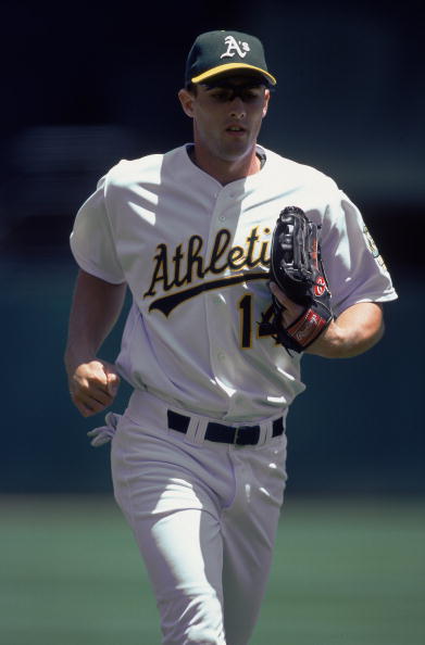 29 Jun 2000:  Ben Grieve #14 of Oakland Athletics running during the game against the Texas Reangers at the Network Associates Coliseum in Oakland, California. The Rangers defeated the Athletics 3-1.Mandatory Credit: Jed Jacobsohn  /Allsport
