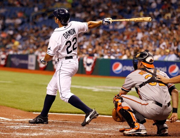 ST. PETERSBURG, FL - APRIL 02:  Outfielder Johnny Damon #22 of the Tampa Bay Rays flies out against the Baltimore Orioles during the game at Tropicana Field on April 2, 2011 in St. Petersburg, Florida.  (Photo by J. Meric/Getty Images)