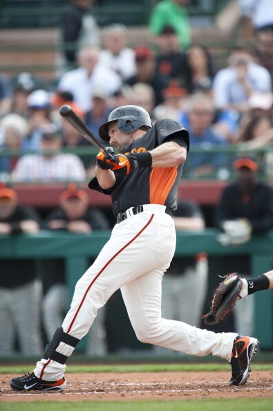 SCOTTSDALE, AZ - FEBRUARY 25: Mark DeRosa #7 of the San Francisco Giants bats during a spring training game against the Arizona Diamondbacks at Scottsdale Stadium on February 25, 2011 in Scottsdale, Arizona. (Photo by Rob Tringali/Getty Images)
