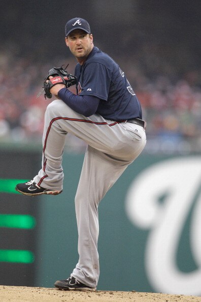 WASHINGTON, DC - MARCH 31:  Starting pitcher Derek Lowe #32 of the Atlanta Braves delivers to a Washington Nationals batter during the third inning at Nationals Park on March 31, 2011 in Washington, DC.  (Photo by Rob Carr/Getty Images)