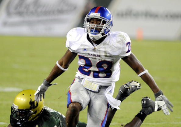 TAMPA, FL - SEPTEMBER 12: Wide receiver Daymond Patterson #28 of the Kansas University Jayhawks dives or a pass against the University of South Florida Bulls at Raymond James Stadium on September 12, 2008 in Tampa, Florida.  (Photo by Al Messerschmidt/Get