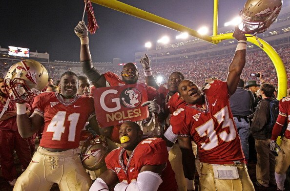 TALLAHASSEE, FL - NOVEMBER 27: Chad Abram #41, Ty Jones #33, Vince Williams #11, and Lonnie Pryor #24 of the Florida State Seminoles celebrate a win against the Florida Gators at Doak Campbell Stadium on November 27, 2010 in Tallahassee, Florida.  (Photo