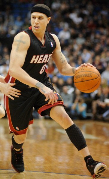 MINNEAPOLIS, MN - APRIL 1: Mike Bibby #0 of Miami Heat drives to the basket against the Minnesota Timberwolves during the first half of a basketball game at Target Center on April 1, 2011 in Minneapolis, Minnesota. NOTE TO USER: User expressly acknowledge